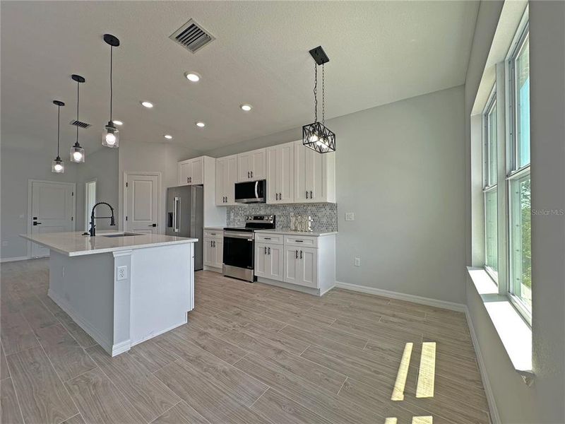 Furnished interior view inside a new home in , Port Charlotte (Image 4).