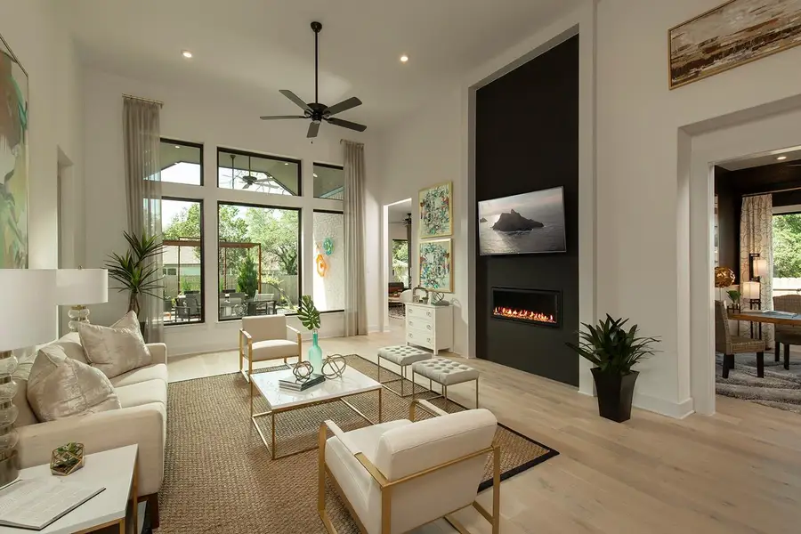 Family Room with soaring ceiling & fireplace - Representative Photo Family Room with soaring ceiling & fireplace - Representative Photo