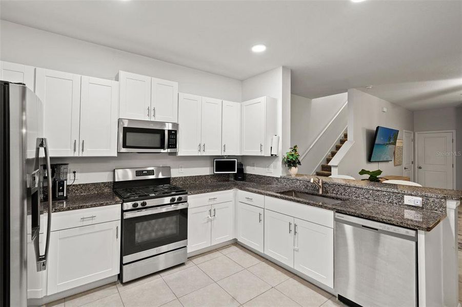 Furnished interior view inside a new home in , New Port Richey (Image 16).