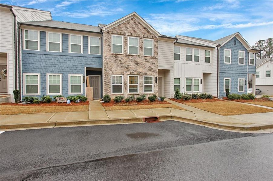 Front exterior of a new home in , Douglasville, GA, highlighting curb appeal (Image 22).
