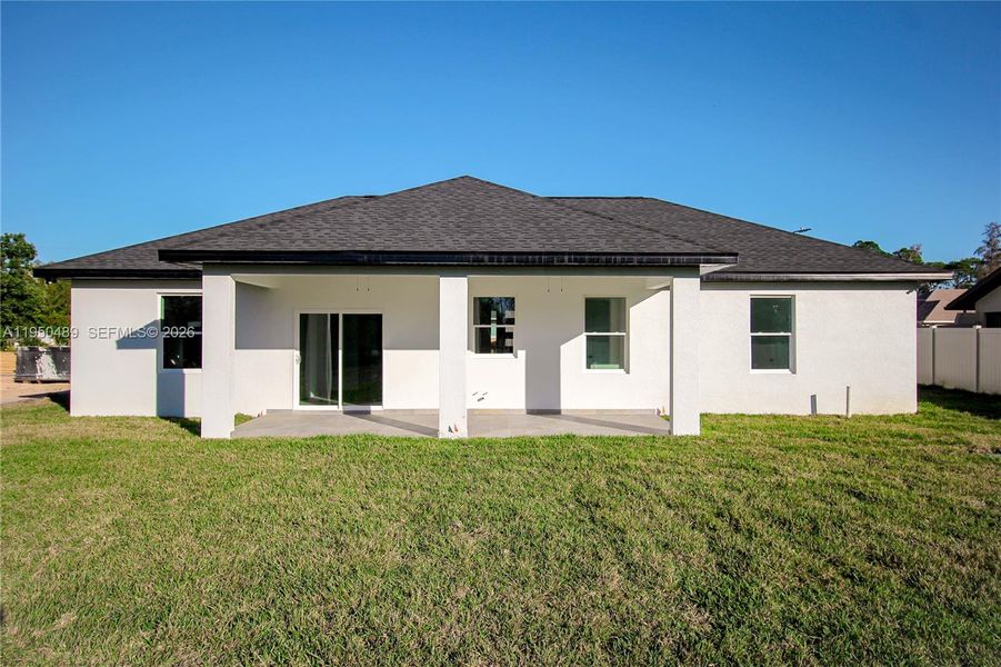 Exterior details and patio area of a home in , Sebring (Image 3).