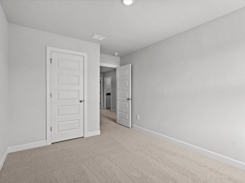 Spacious, unfurnished interior of a new home in Northbrook Village Townes, Taylors (Image 18).