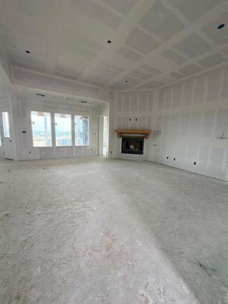 Unfurnished living room with a fireplace