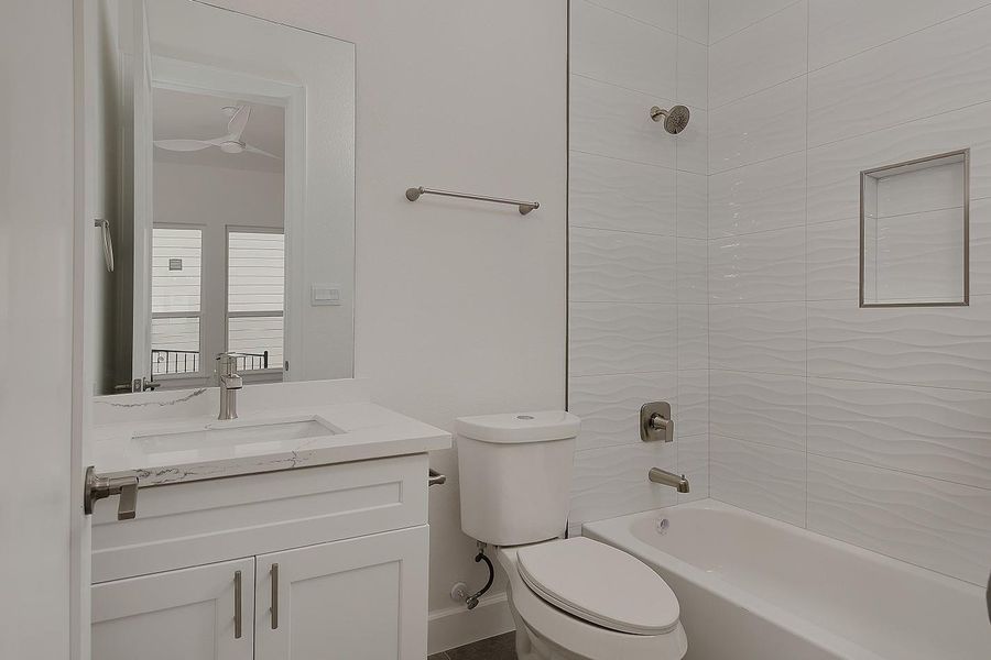 Furnished interior view inside a new home in Lake Breeze, Willis (Image 18).