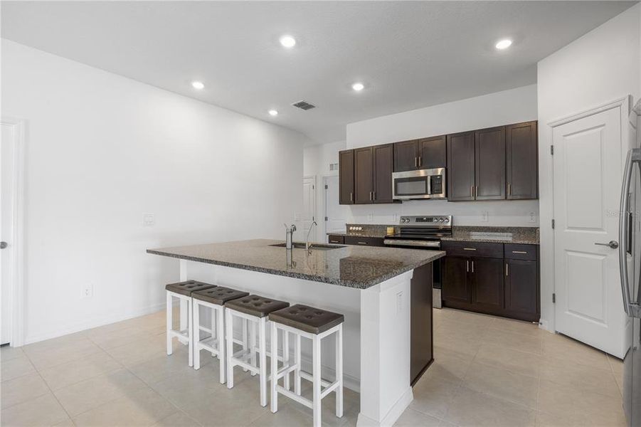 Furnished interior view inside a new home in Wind Meadows South, Bartow (Image 34).