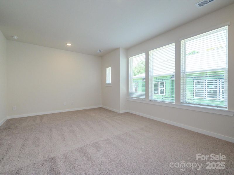 Spacious, unfurnished interior of a new home in Central Living at Craig, Charlotte (Image 28).