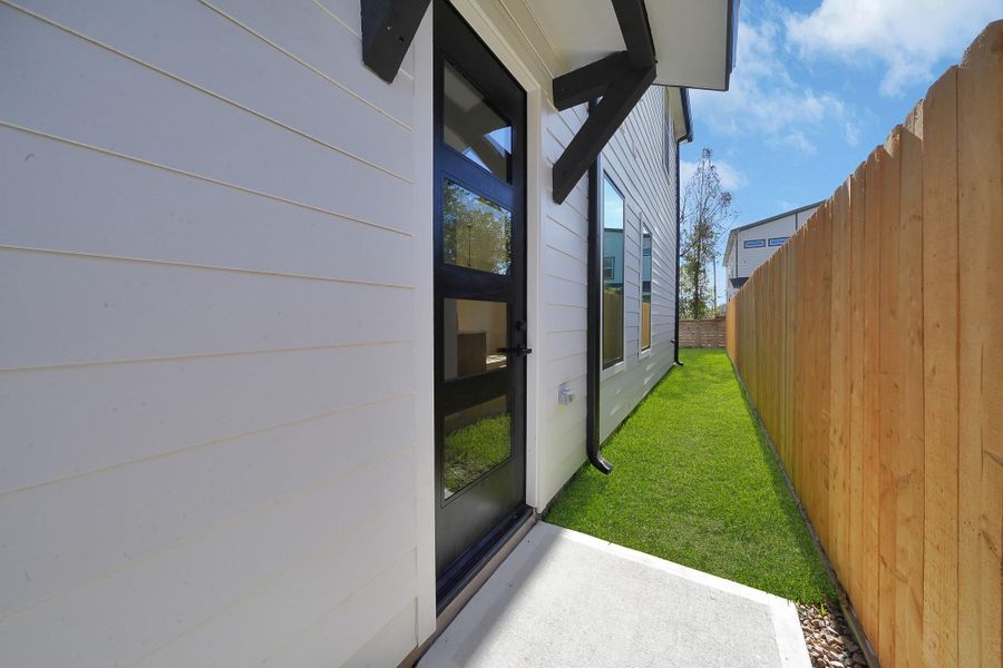 Exterior details and patio area of a home in , Houston (Image 4). Exterior details and patio area of a home in , Houston (Image 4).