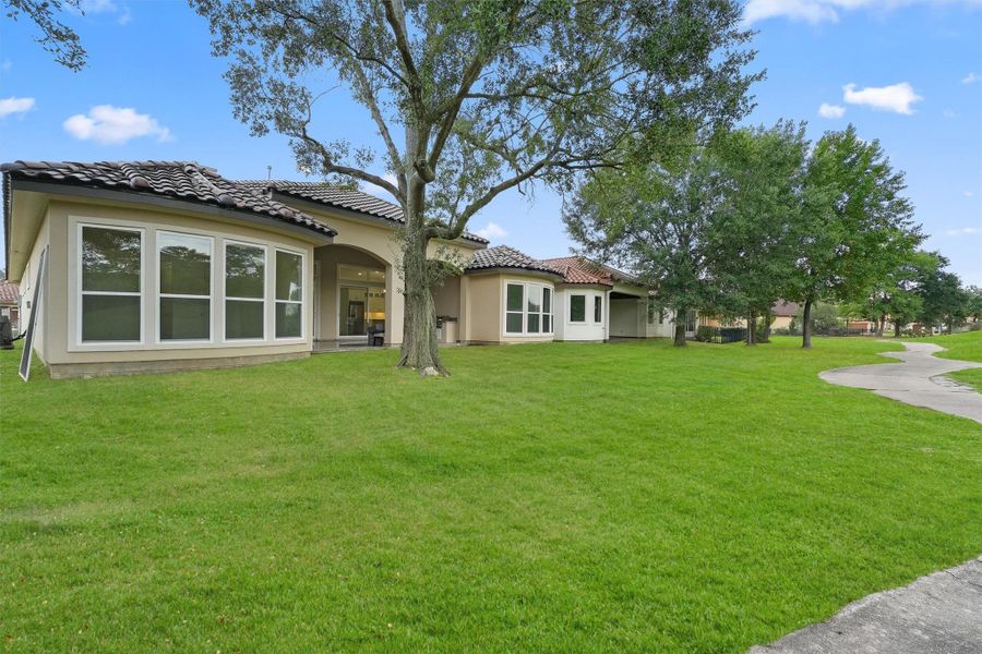 Front exterior of a new home in , Houston, TX, highlighting curb appeal (Image 2).