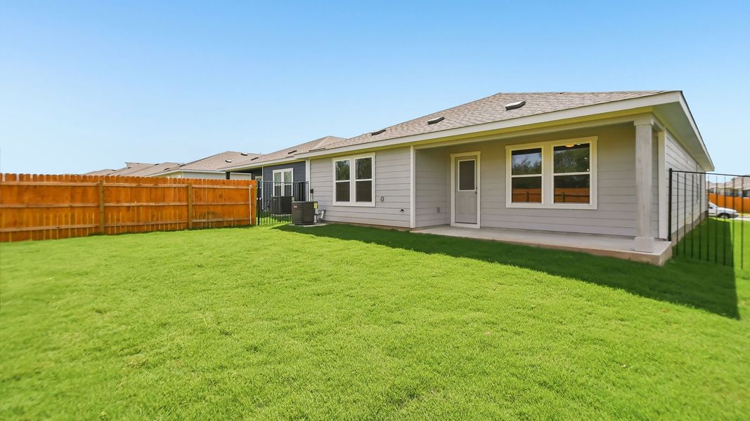 Exterior details and patio area of a home in Trails at Wildhorse, Austin (Image 22).