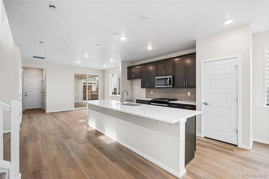 Furnished interior view inside a new home in Barefoot Village, Firestone (Image 6).