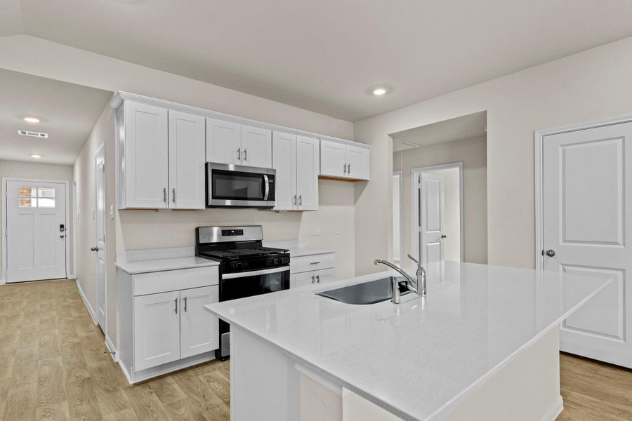 Furnished interior view inside a new home in Whisper South, San Marcos (Image 5).