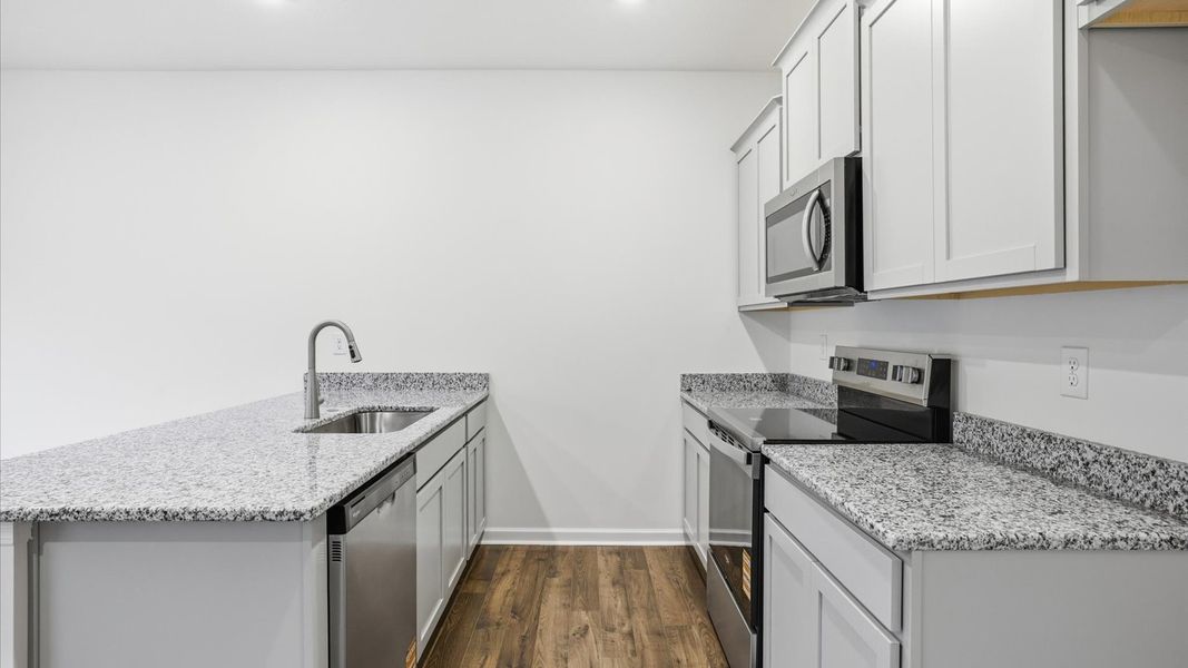 Furnished interior view inside a new home in Cherokee Crossing, Kodak (Image 6).