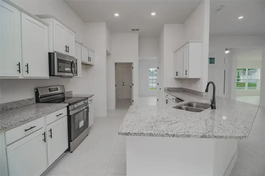 Furnished interior view inside a new home in Hickory Ridge Estates, Lake Wales (Image 6).