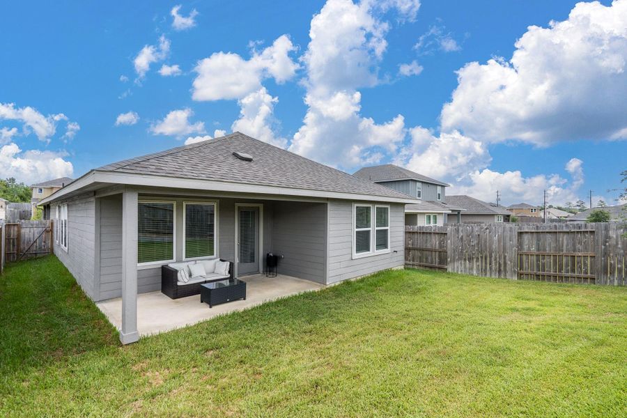 Exterior details and patio area of a home in Pine Lake Cove - Traditional Series, Montgomery (Image 17).
