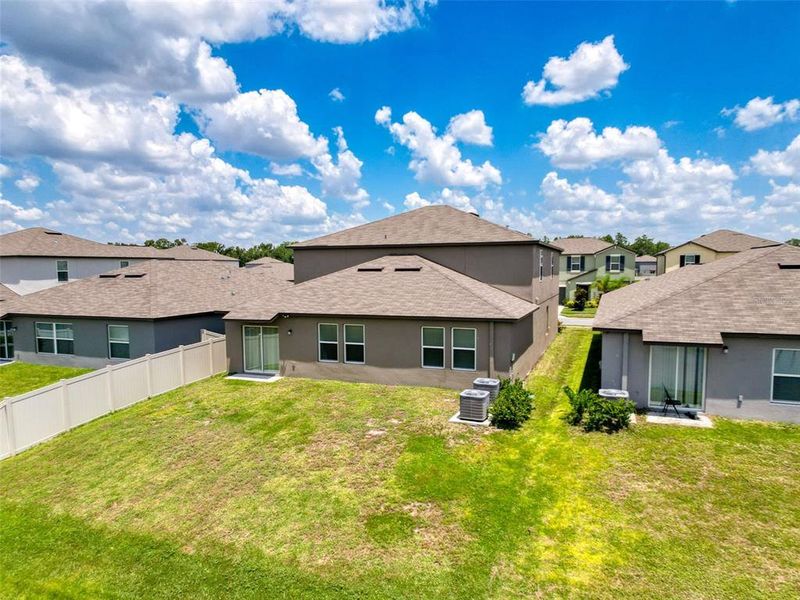 Front exterior of a new home in , Lakeland, FL, highlighting curb appeal (Image 1).