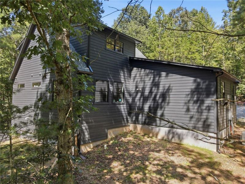 Exterior details and patio area of a home in , Ellijay (Image 26).