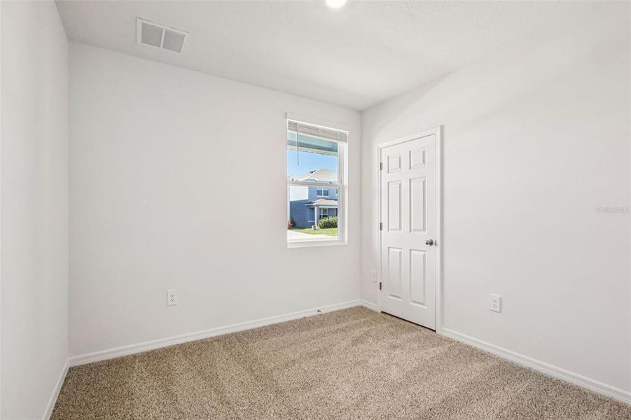 Spacious, unfurnished interior of a new home in Lake Deer Estates - Classic Series, Poinciana (Image 23).