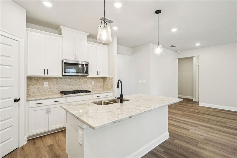 Furnished interior view inside a new home in Martin Springs - Estate Series, Lawrenceville (Image 9).
