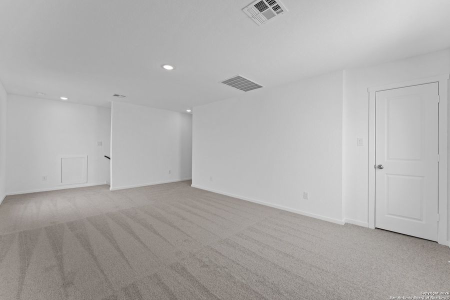 Spacious, unfurnished interior of a new home in Voss Farms: Watermill Collection, New Braunfels (Image 27).