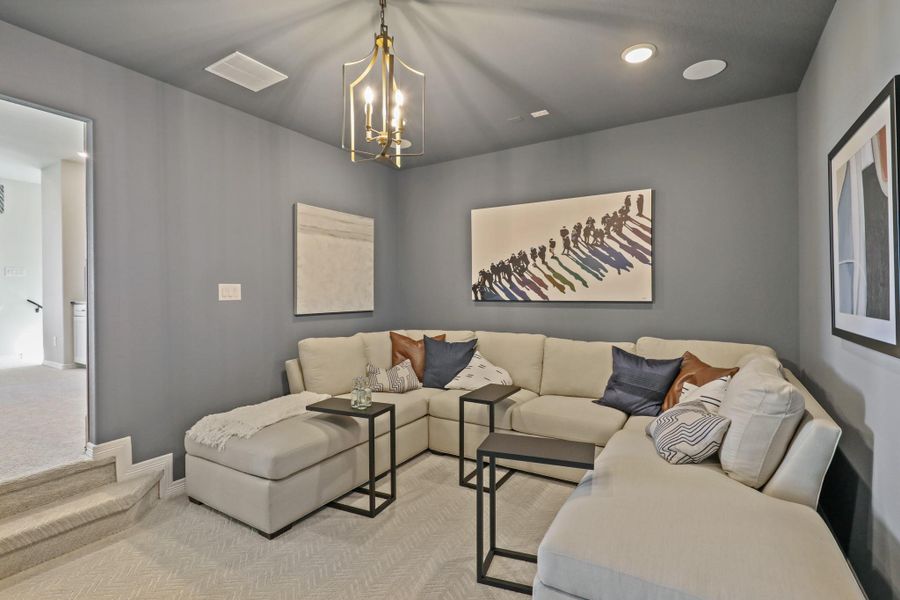 Representational image of the cozy yet inviting media room.