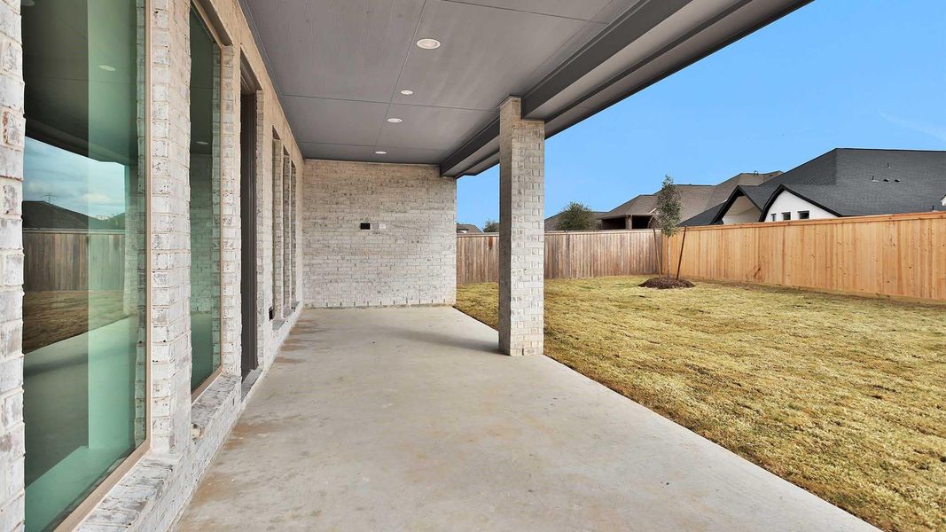 Exterior details and patio area of a home in Bridgeland, Cypress (Image 3).
