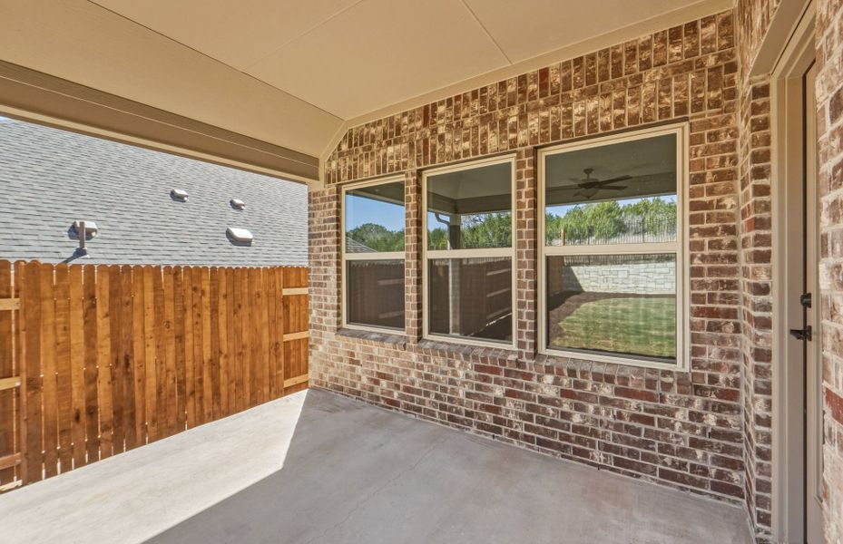 Exterior details and patio area of a home in West Cypress Hills, Spicewood (Image 27). Exterior details and patio area of a home in West Cypress Hills, Spicewood (Image 27).