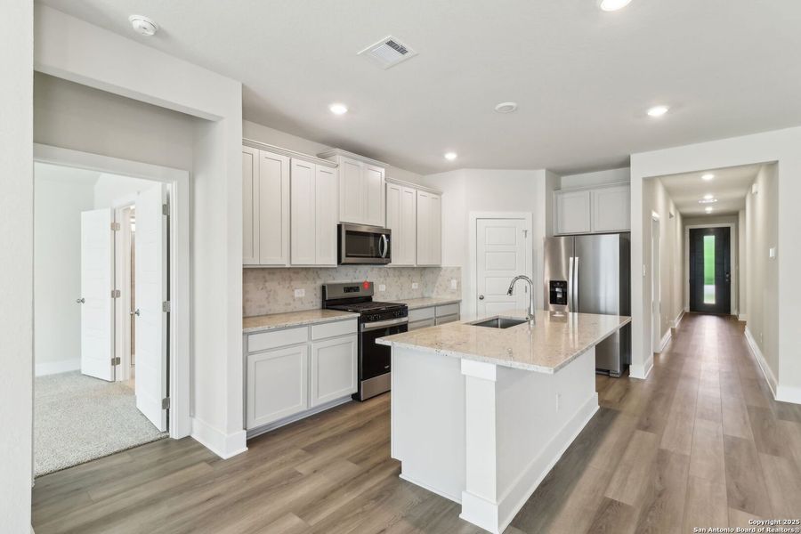 Furnished interior view inside a new home in Comanche Ridge, San Antonio (Image 9).