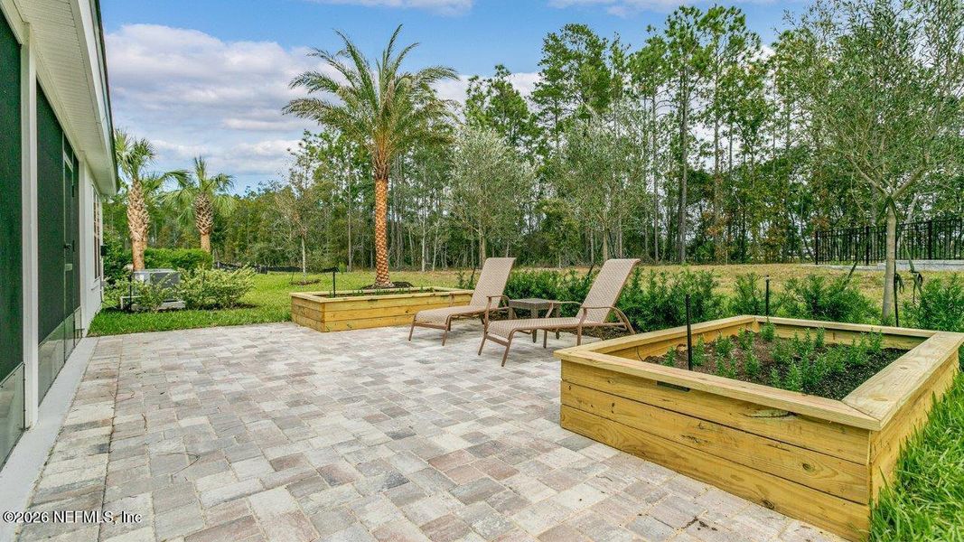 Exterior details and patio area of a home in Sawmill Branch, Palm Coast (Image 27).
