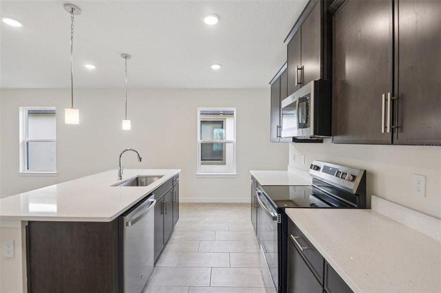 Furnished interior view inside a new home in Grasslands West, Lakeland (Image 9).