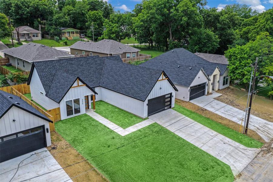 Front exterior of a new home in , Dallas, TX, highlighting curb appeal (Image 18).