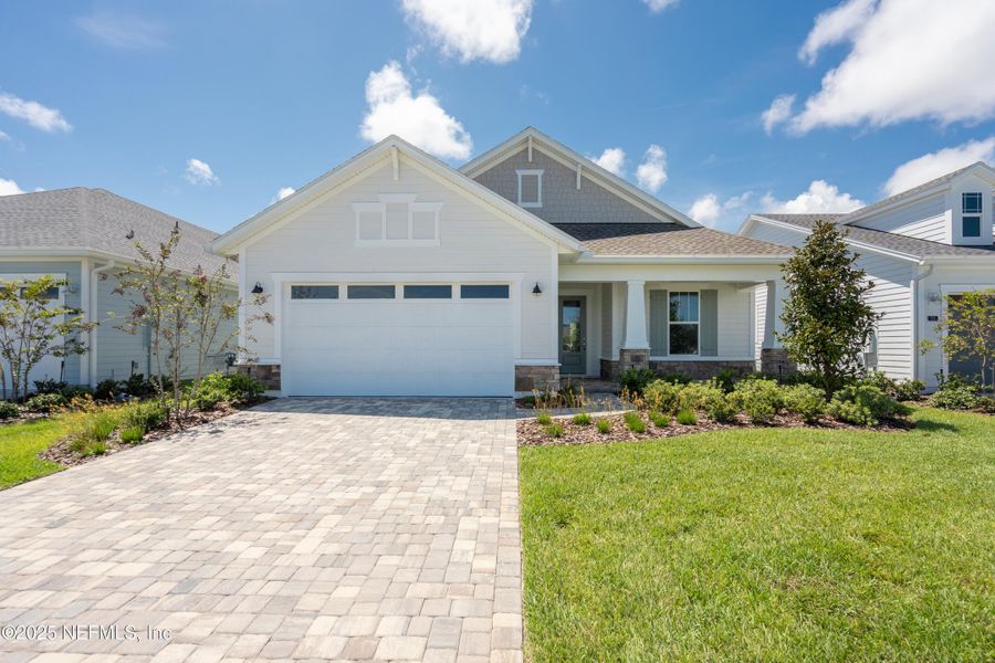 Front exterior of a new home in Madeira, St. Augustine, FL, highlighting curb appeal (Image 2).