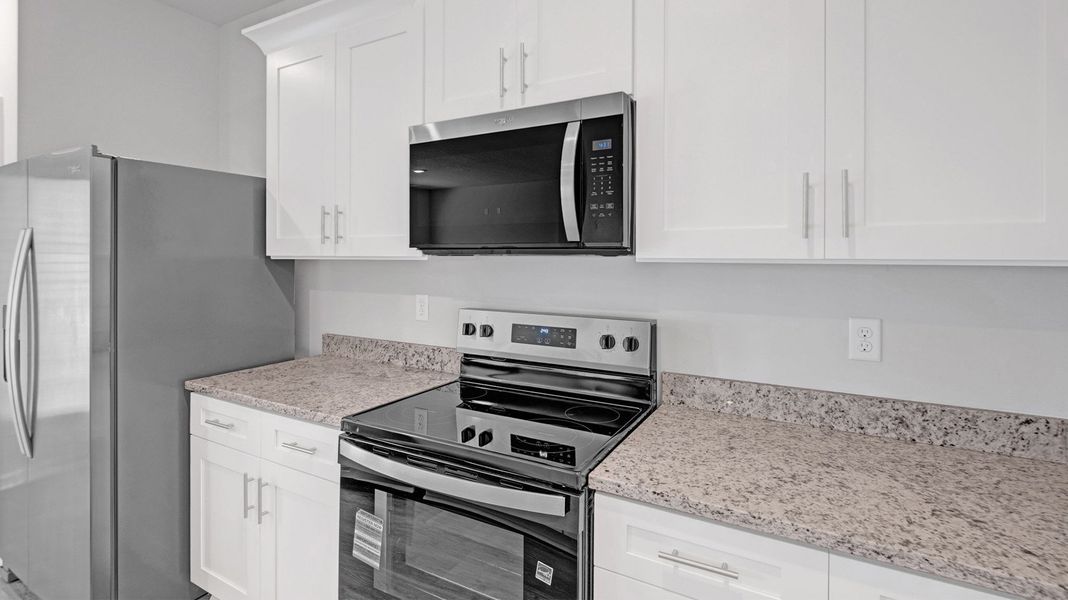 Furnished interior view inside a new home in Huntington Estates, Millington (Image 10).