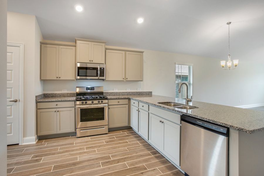 Furnished interior view inside a new home in Bayou Maison, Dickinson (Image 5).