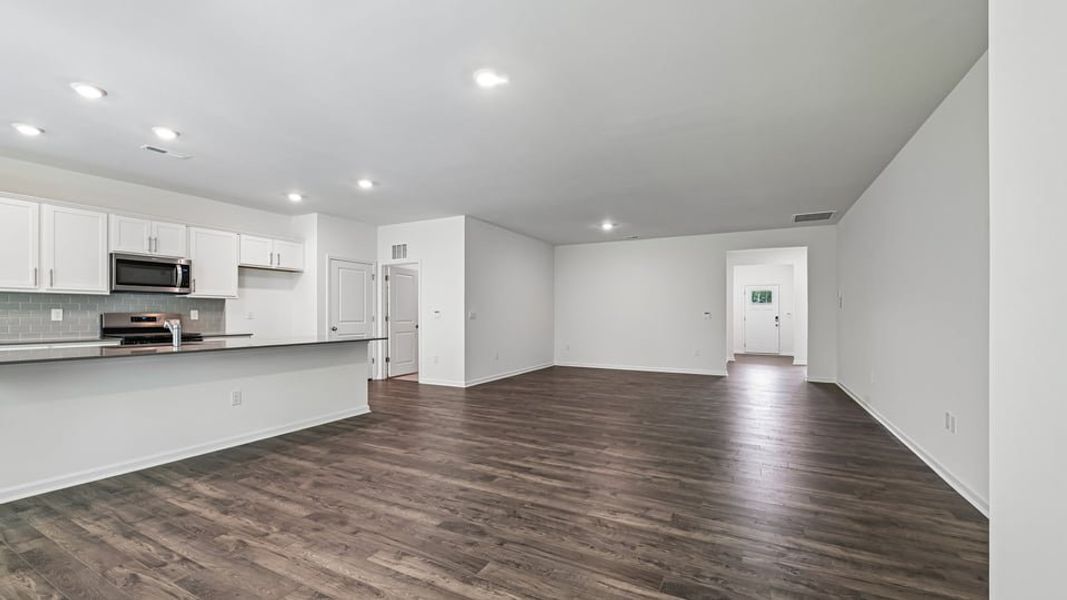 Spacious, unfurnished interior of a new home in The Villas at Laurel Oaks, Sanford (Image 13).