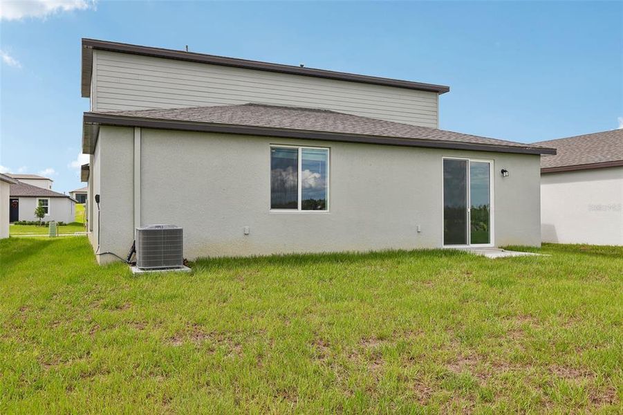 Exterior details and patio area of a home in Benton Hills - Classic Series, Brooksville (Image 23).