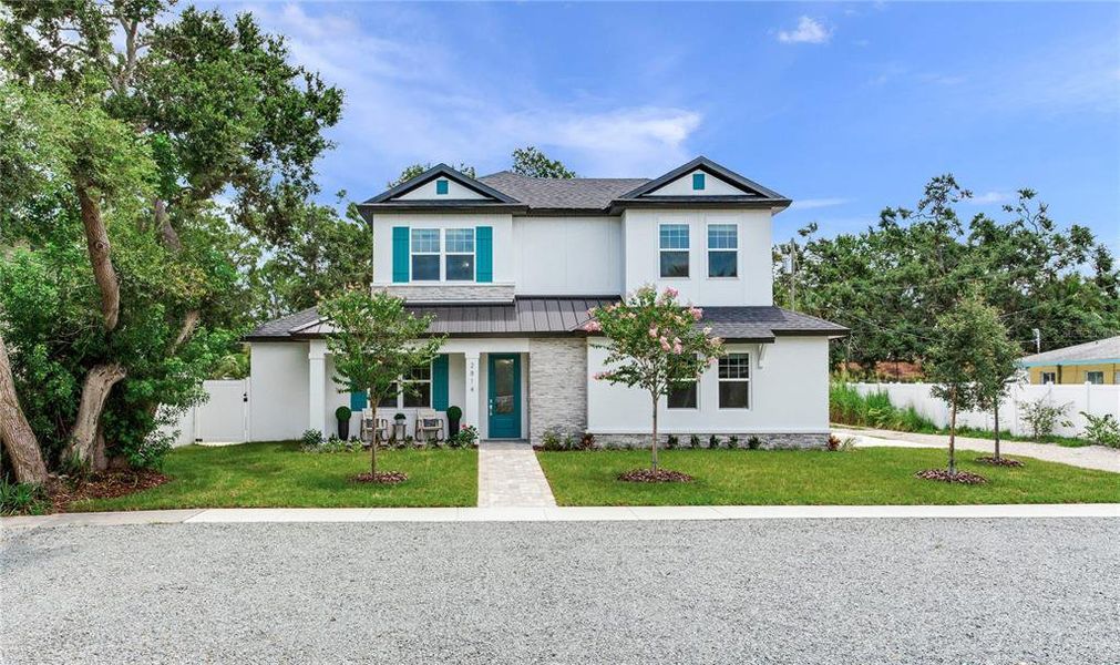 Front exterior of a new home in , Gulfport, FL, highlighting curb appeal (Image 27). Front exterior of a new home in , Gulfport, FL, highlighting curb appeal (Image 27).