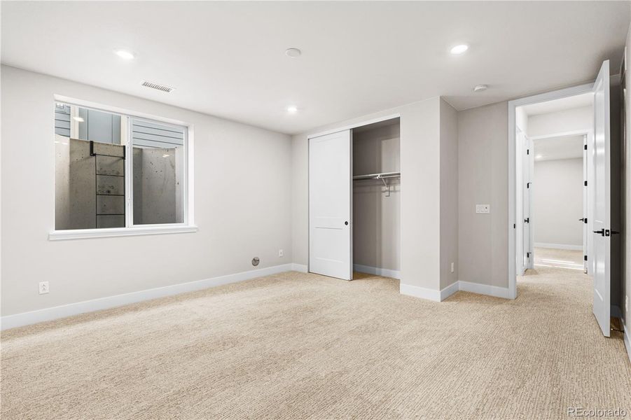 Spacious, unfurnished interior of a new home in Luxe at The Canyons, Castle Pines (Image 46).