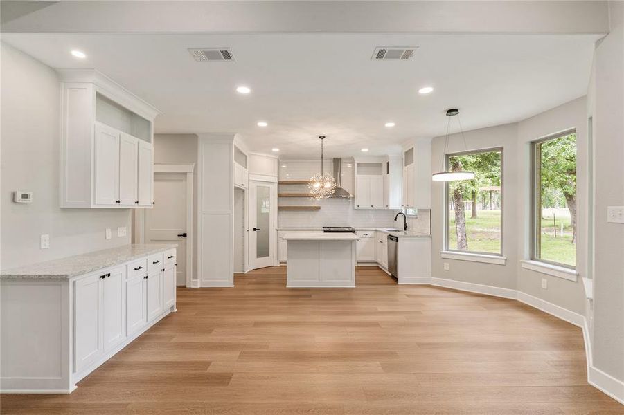 Kitchen with breakfast nook and bay window Kitchen with breakfast nook and bay window