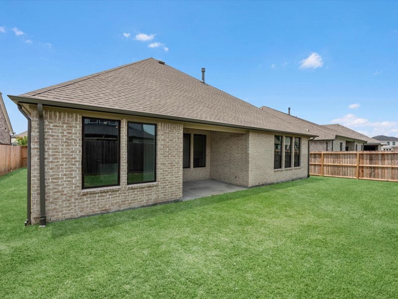 Exterior details and patio area of a home in Oakwood Estates, Waller (Image 3). Exterior details and patio area of a home in Oakwood Estates, Waller (Image 3).