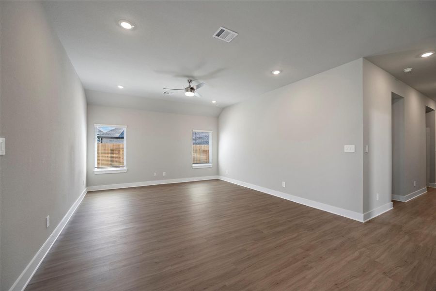 Large windows fill the space with light while the neutral tones make decorating effortless.