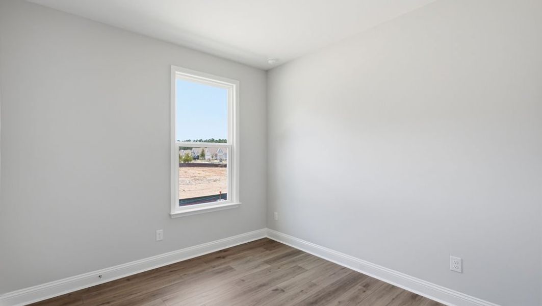 Spacious, unfurnished interior of a new home in Sun City Hilton Head, Bluffton (Image 32).