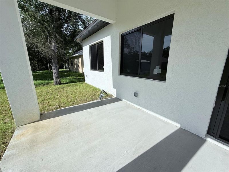 Exterior details and patio area of a home in , Port Charlotte (Image 24).