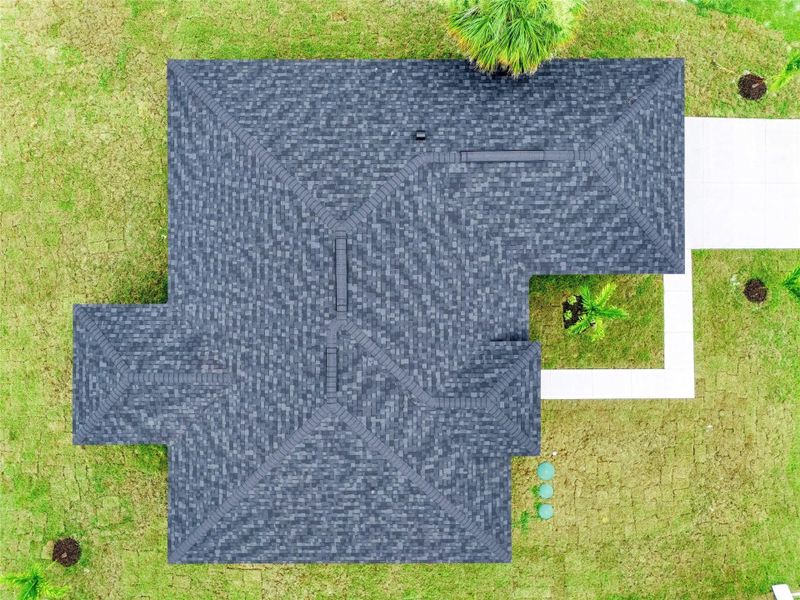 Front exterior of a new home in , Palm Bay, FL, highlighting curb appeal (Image 27).