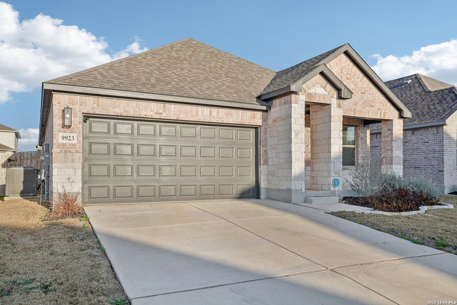 Front exterior of a new home in Kallison Ranch, San Antonio, TX, highlighting curb appeal (Image 2). Front exterior of a new home in Kallison Ranch, San Antonio, TX, highlighting curb appeal (Image 2).