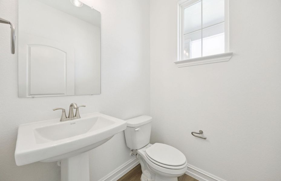 Powder room with elegant finishes *Real home pictured Powder room with elegant finishes *Real home pictured