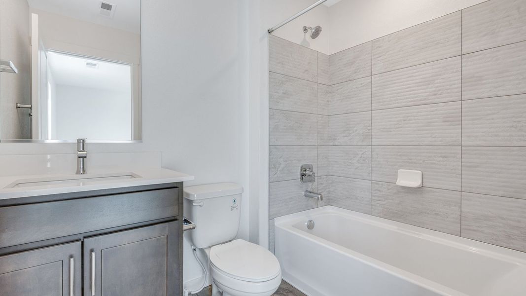 Furnished interior view inside a new home in Trails at Crowfoot, Parker (Image 9).