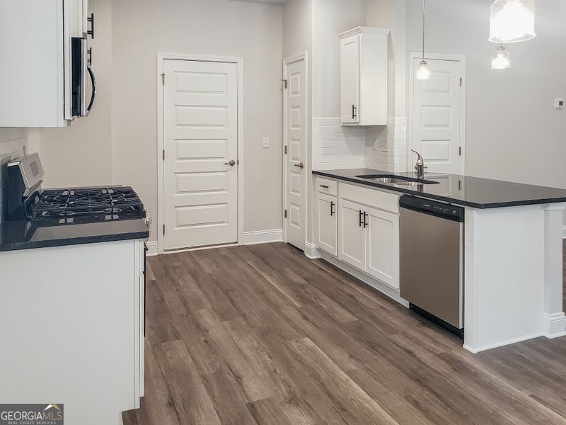 Furnished interior view inside a new home in Windmill Park, Carrollton (Image 3).