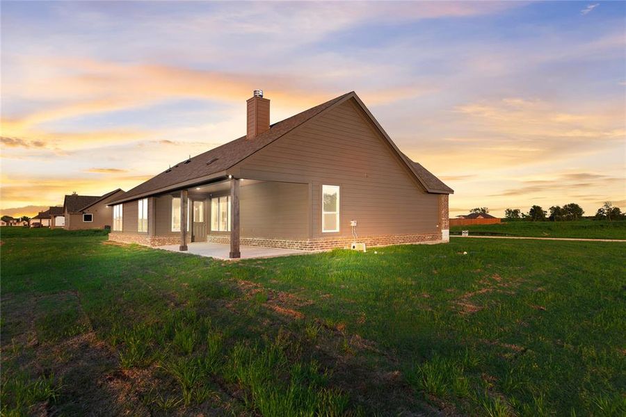 Front exterior of a new home in Oak Valley, Oak Ridge, TX, highlighting curb appeal (Image 25).