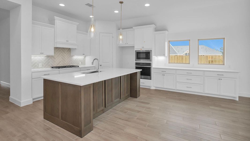 Furnished interior view inside a new home in Artavia 50', Conroe (Image 4).