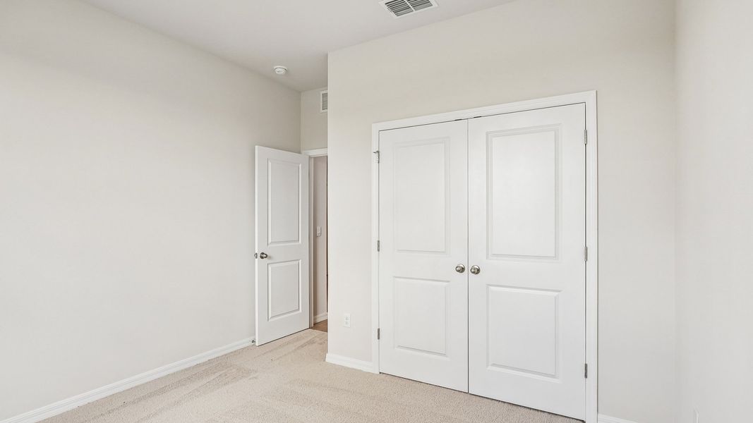 Representative unfurnished interior of a home built from the Lantana by D.R. Horton in Silverstone North, Palmetto (Image 29).